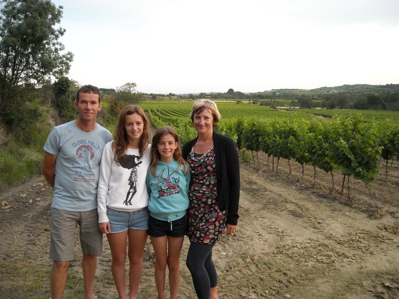 Us in front of a vinyard
