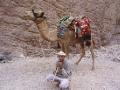 My camel posing with herdsman