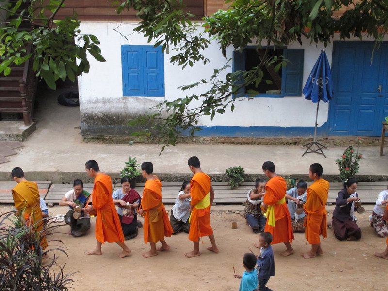 Monks receiving food