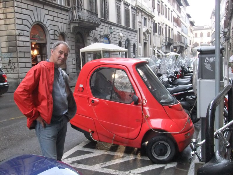 florence.  an electric car plugged in for the night.