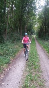Biking along through the forest