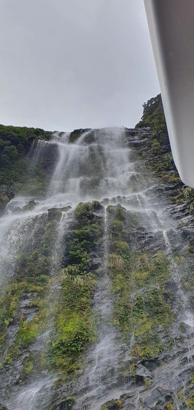Under a waterfall