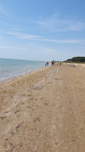 The long sandy beach stretching towards Caorle