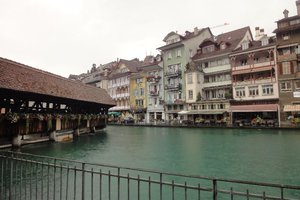 Bridge and old Thun houses along the Aare River