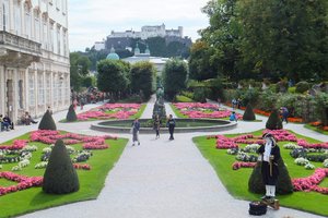 The colourful gardens in Salzburg looking towards the castle on the hill