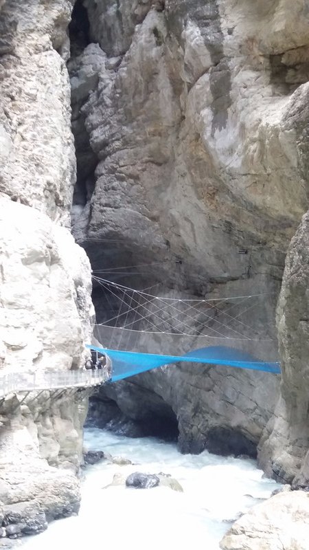 The blue netting Spider Web across the canyon