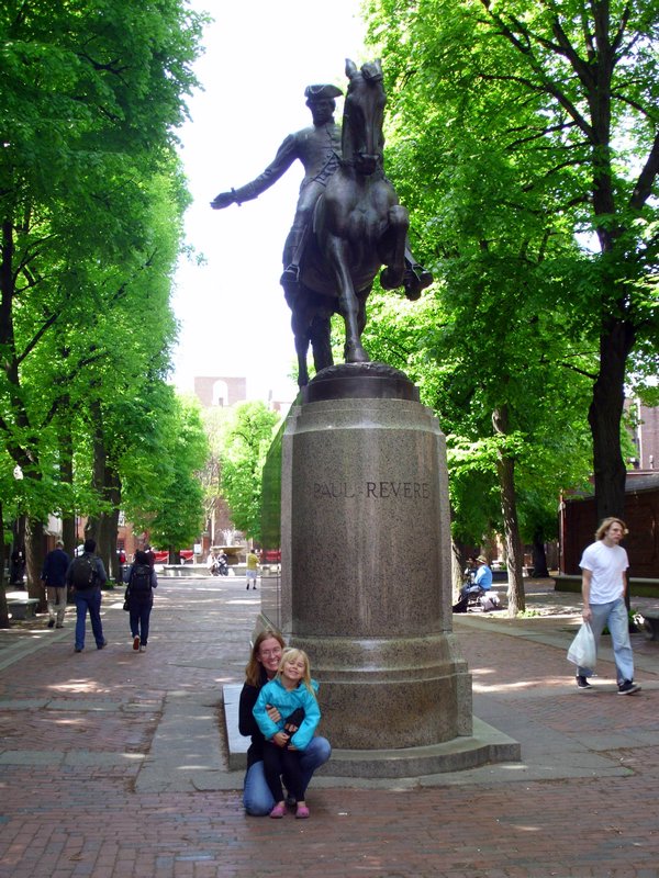 Grace and Jessica in front of the Old North church and the statue of Paul Revere.