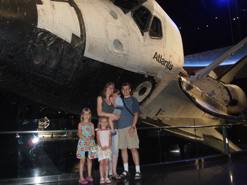 Our famly in front of the space shuttle Atlantis.