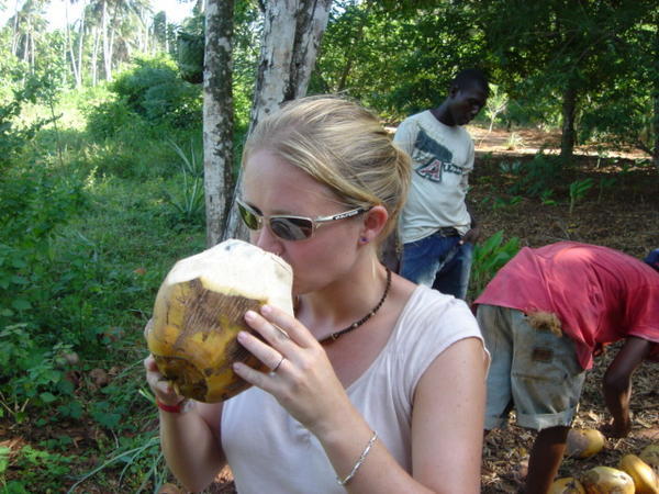 Gemma trying a fresh coconut