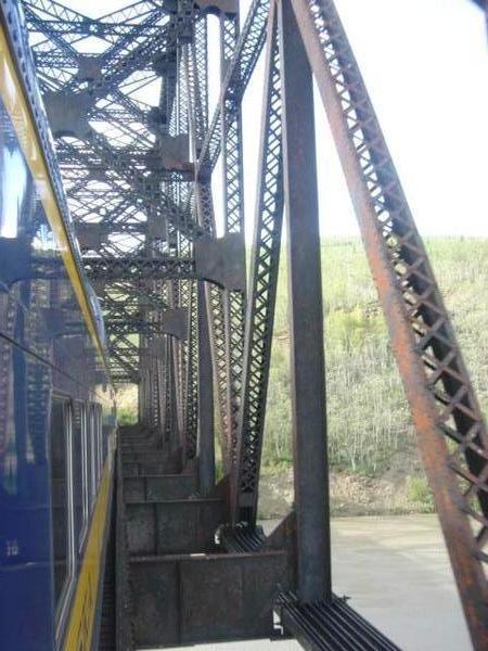Train crosses ancient bridge