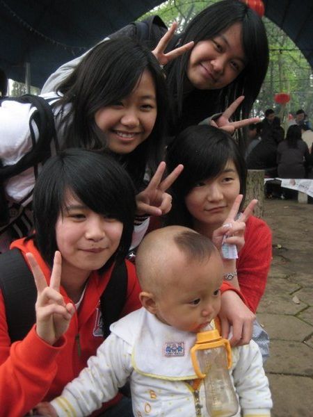 Students and a random baby