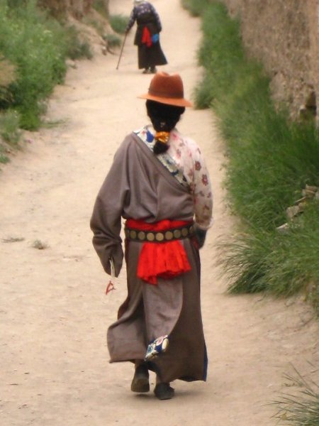 Tibetan woman on pilgrim around the monastery