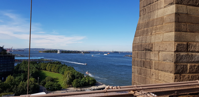 Looking towards Statue of Liberty from Brooklyn Bridge