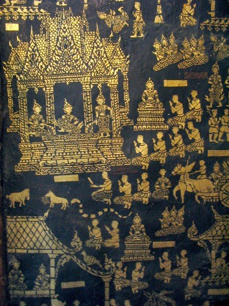 Die Goldverzierungen auf den Waenden in Wat Xieng Thong