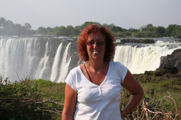 Jen with Vic Falls in background