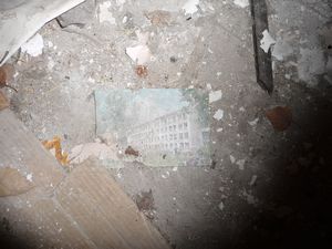 A faded postcard on the floor
