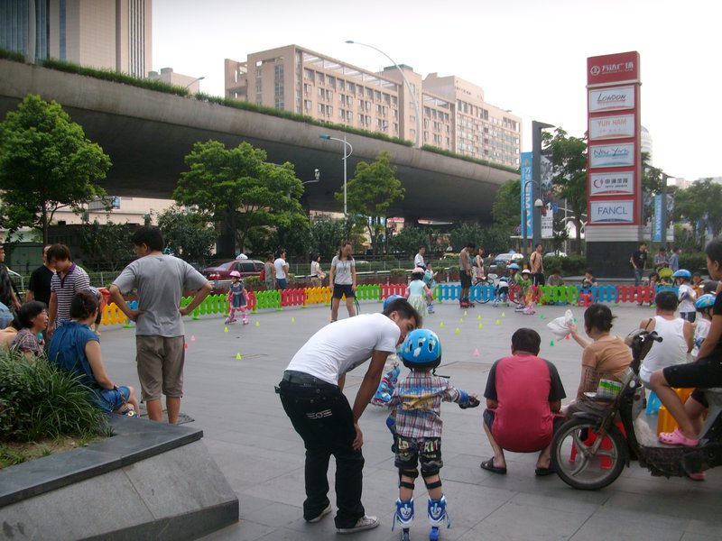 Kids roller blading on the street