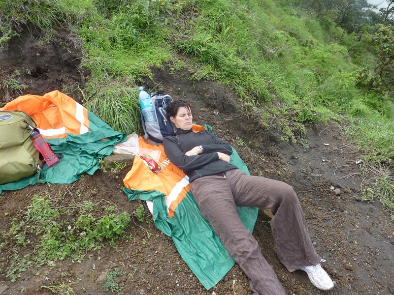 Our resident athlete taking a nap on the side of the volcano after the uphill leg of our 5am hike