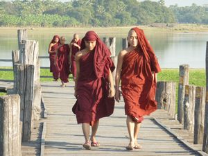 Monks approaching on the bridge