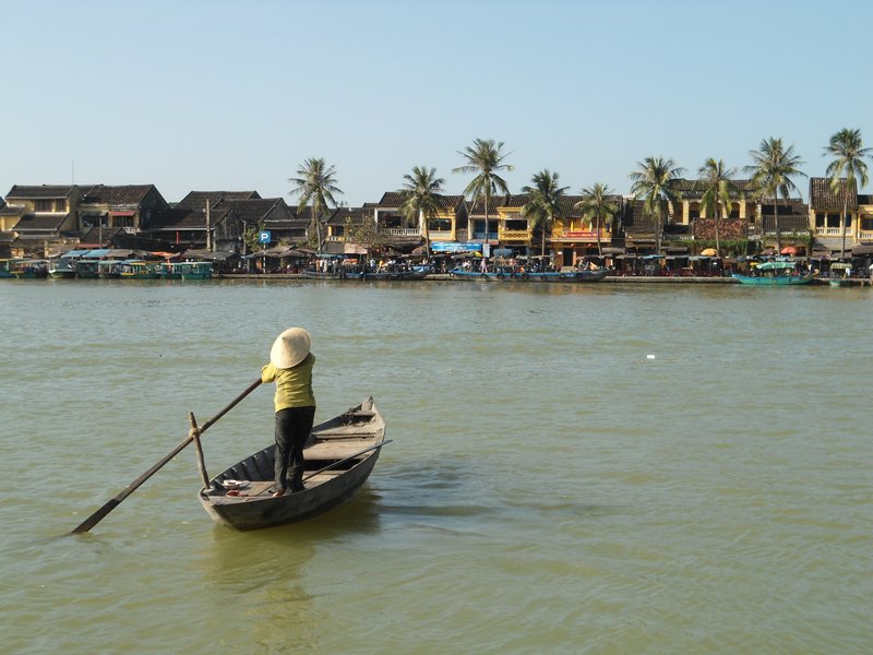Lady Crossing the River to Hoi An