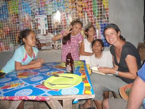 Local girls gather around us as we wait to be fed - Oslob