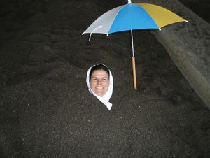 Kate buried in Ibusuki's volcani oit sands