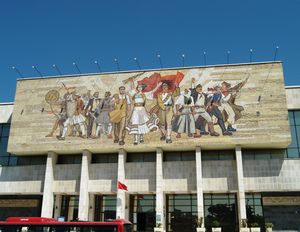 The usual propoganda mural showing the happy workers and fighters - Tirana