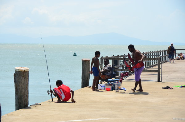 Locals fishing in the pier