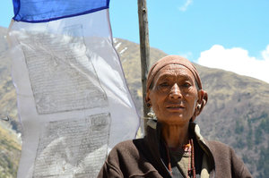 Woman and prayer flags