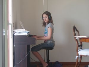 Claudia playing piano