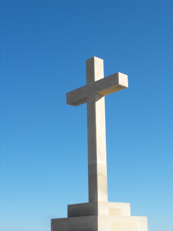 The cross guarding the city
