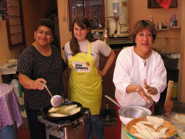 Mari, Amelia, and my host mom Magda making empanadas- they have them here too!