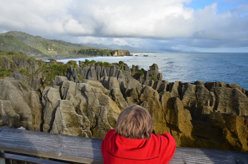 Theo checking out the layers of Pancake Rocks
