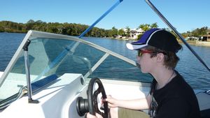 Geddy celebrating his 14th birthday cruising on the Noosa River