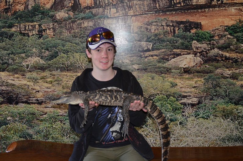 Geddy holding an alligator