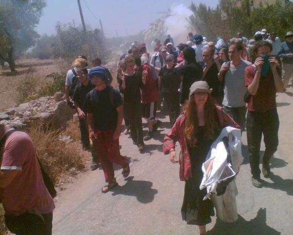 The march is abrupt;ly halted by Israeli soldiers