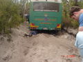 One of the buses stuck in the sand