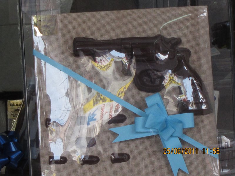 WHAT THE!!  Chocolate revolver and bullet gift pack anyone?