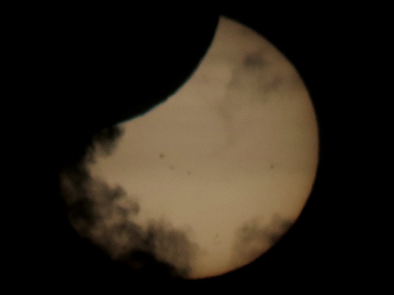 The first we saw of the moon covering the sun as clouds parted.