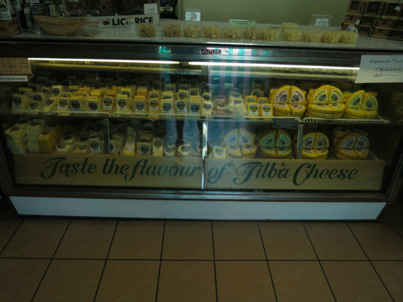 One of two cabinets with the cheese varieties