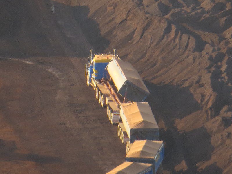 Side tipper unloading iron ore