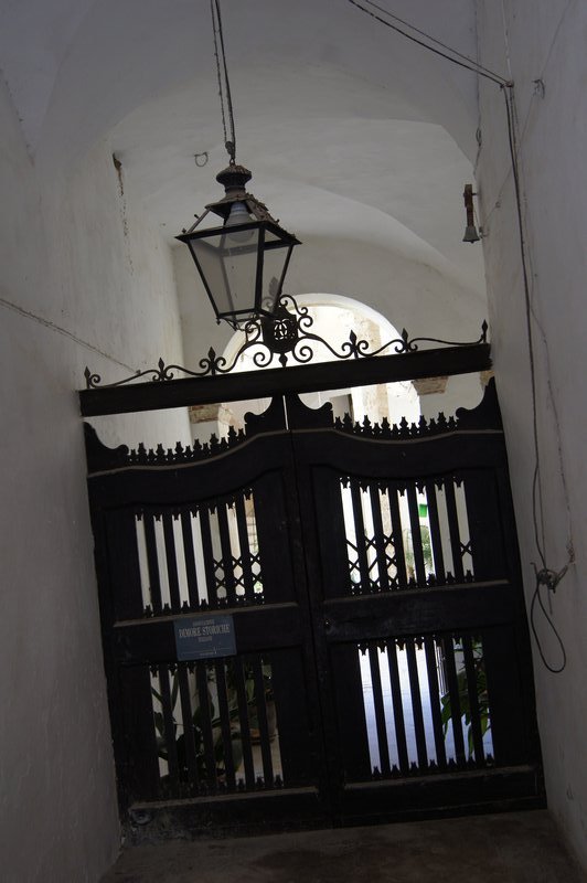 Old gates and lamp, San Gimignano