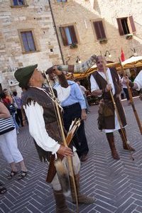 Huntsman blowing his horn, San Gimignano