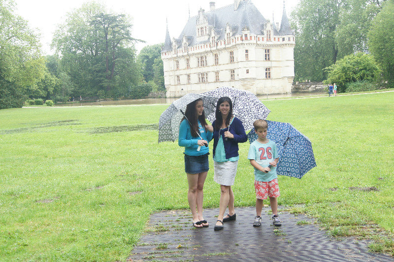 Family with umbrellas
