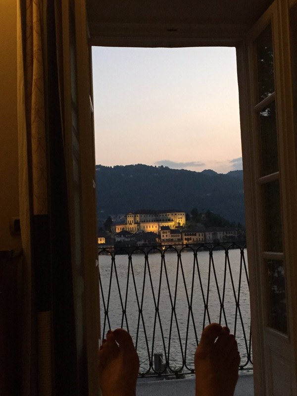Watching my last Orta sunset from bed