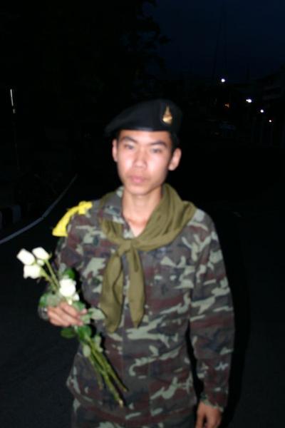 Soldier Receiving White Roses