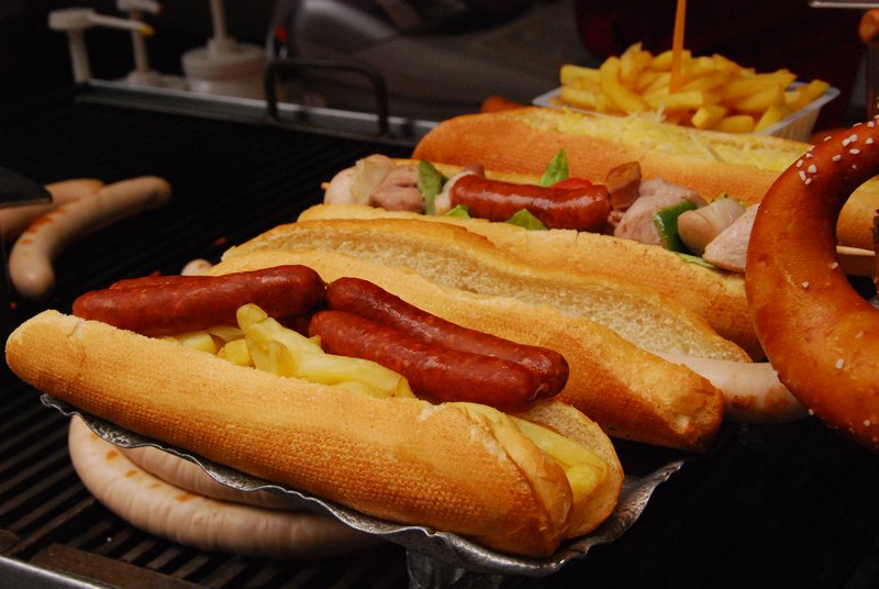 A quad-hotdog with french fries under