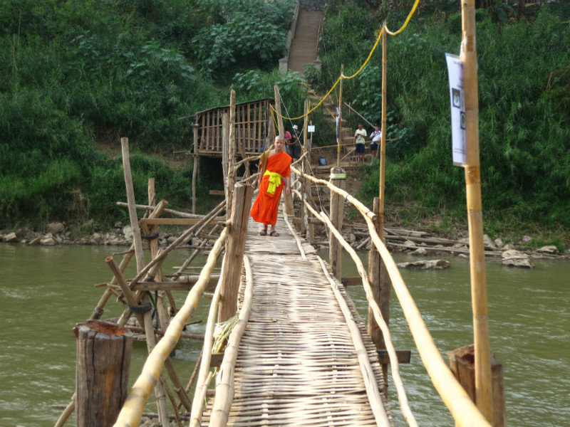 monk on a bridge