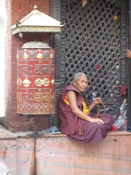 Old Woman at the Temple entrance