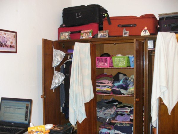 my exploding closet and empty suitcases